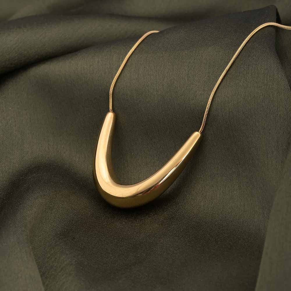 Palmonas Golden Boomerang Necklace