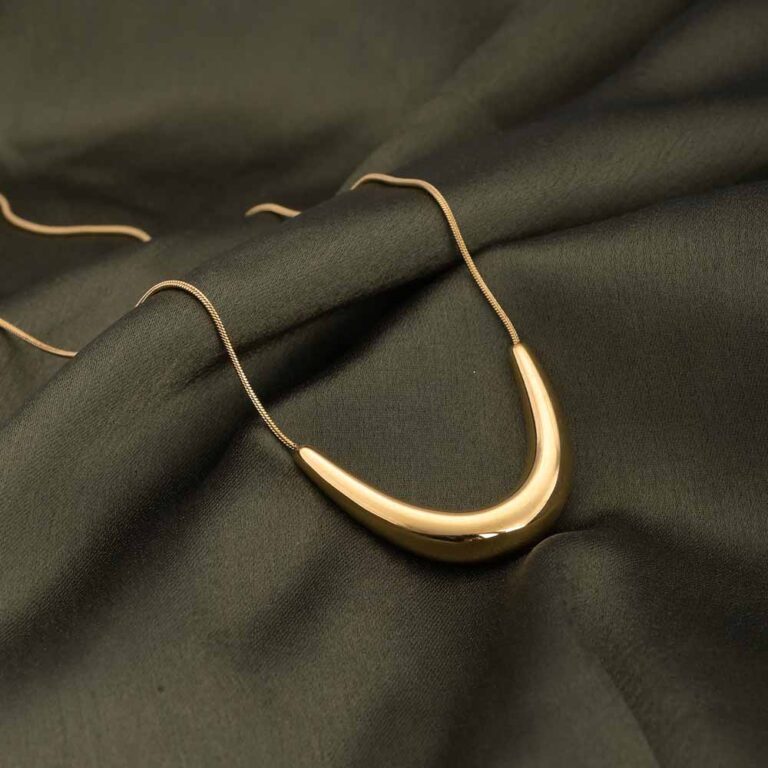 Palmonas Golden Boomerang Necklace